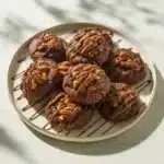 Delicious German Chocolate Cookies with coconut, pecan frosting and chocolate chips.